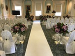 Aisle set for wedding with floral decor