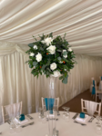 carberry tower high impact floral centrepiece blue drape