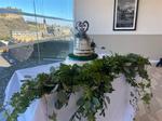 Wedding cake table with wild ivy foliage runner