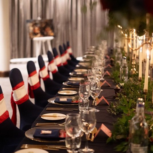 Navy Snug Chair Covers with Red & White Ties Banquet